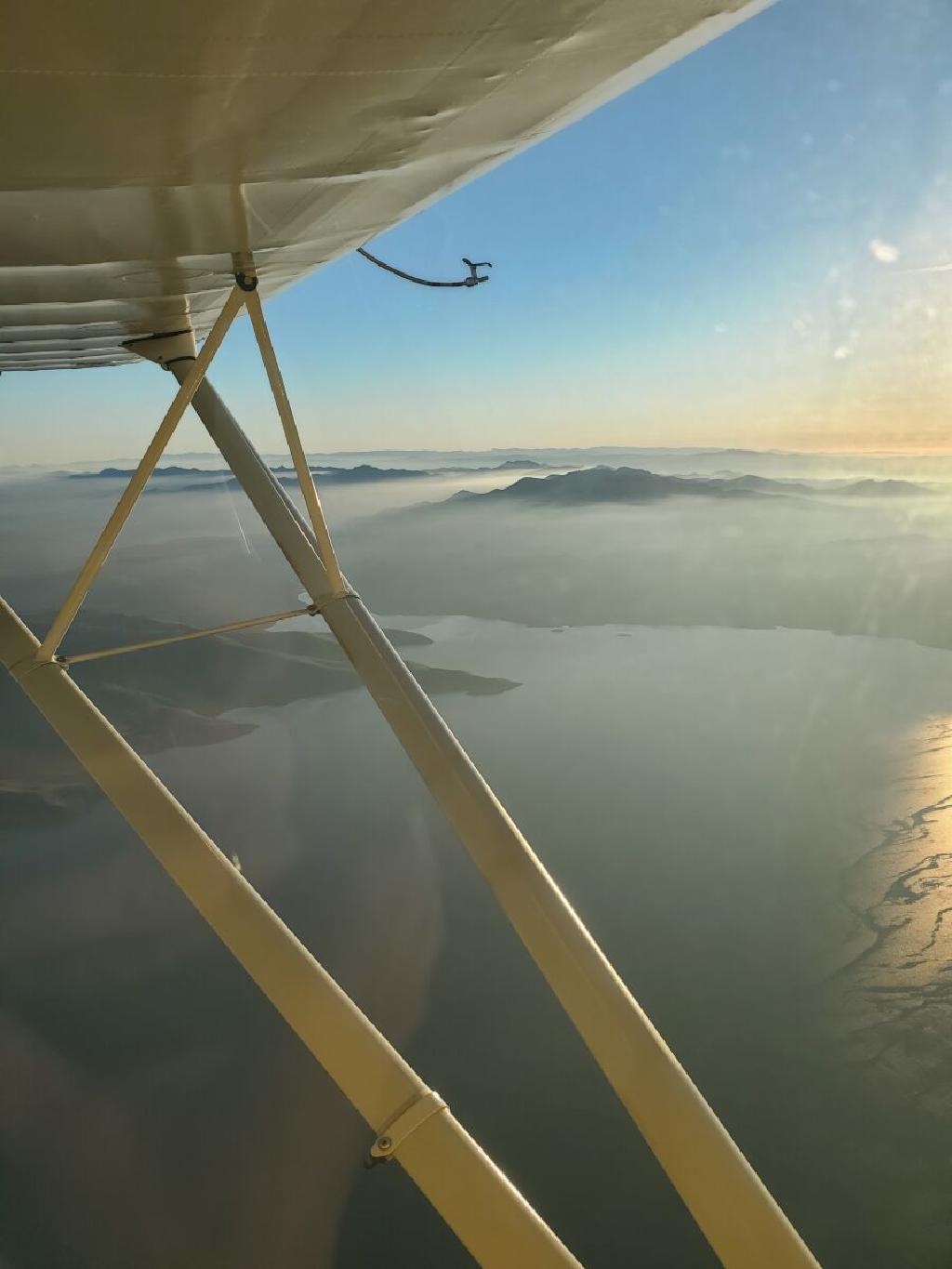 Over Foggy Reservoir at Golden Hour With Long