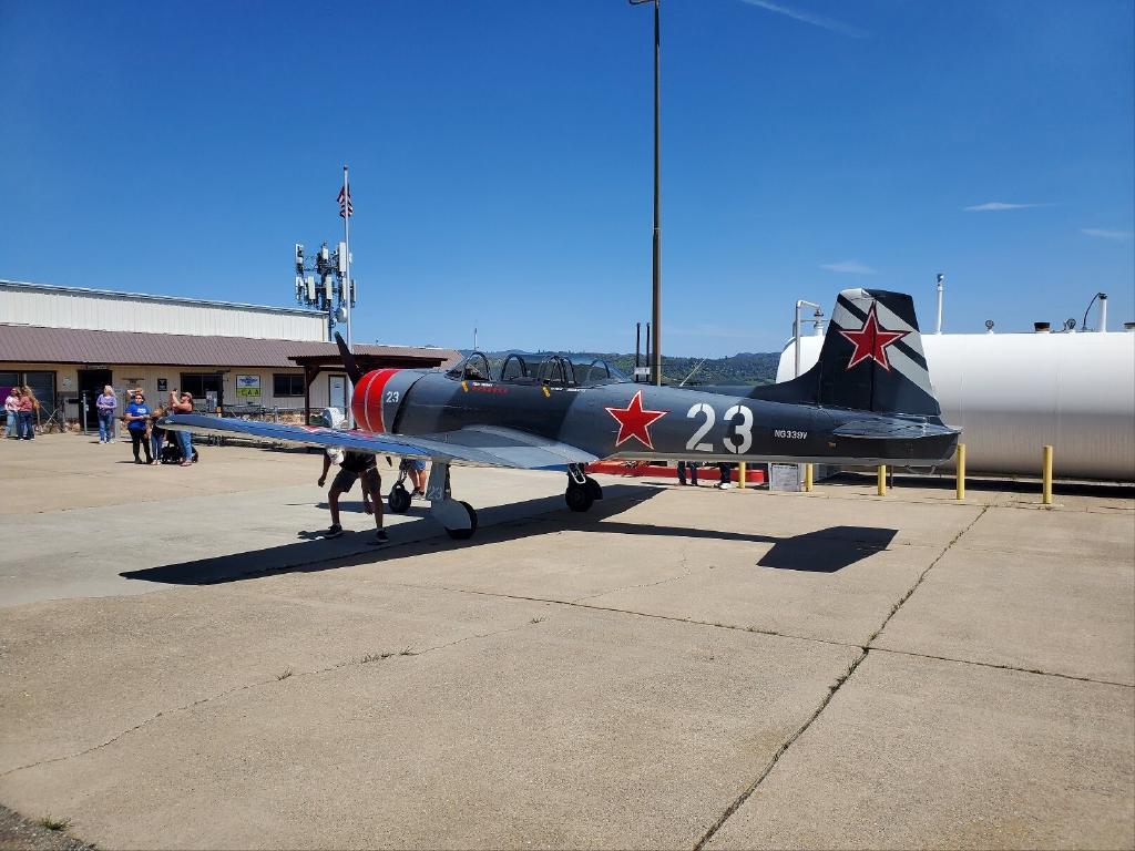 Gray Jak Aircraft by the Fuel Pumps