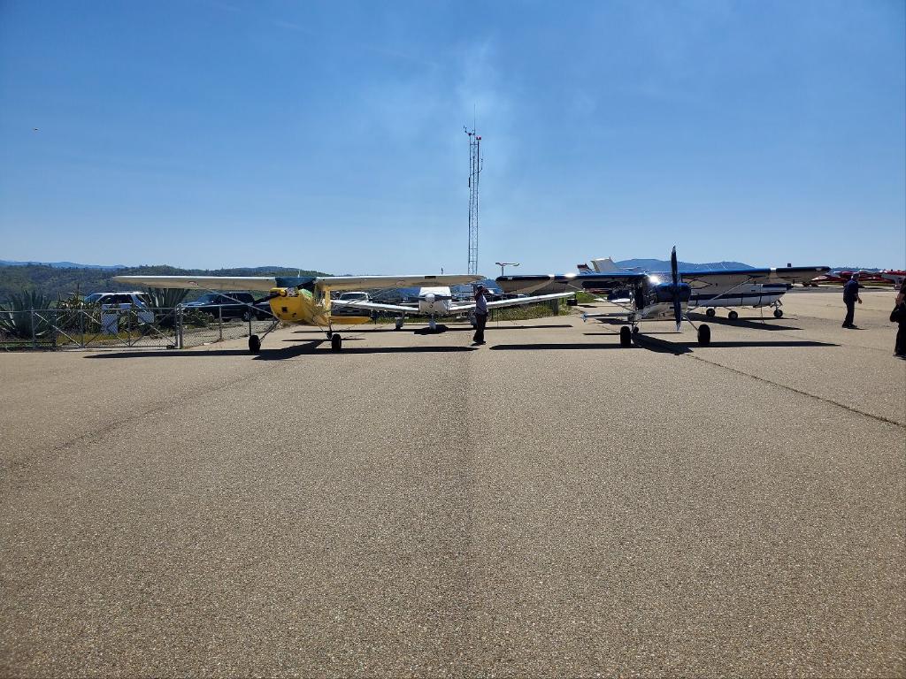 Yellow Cessna 140 on the Left and A