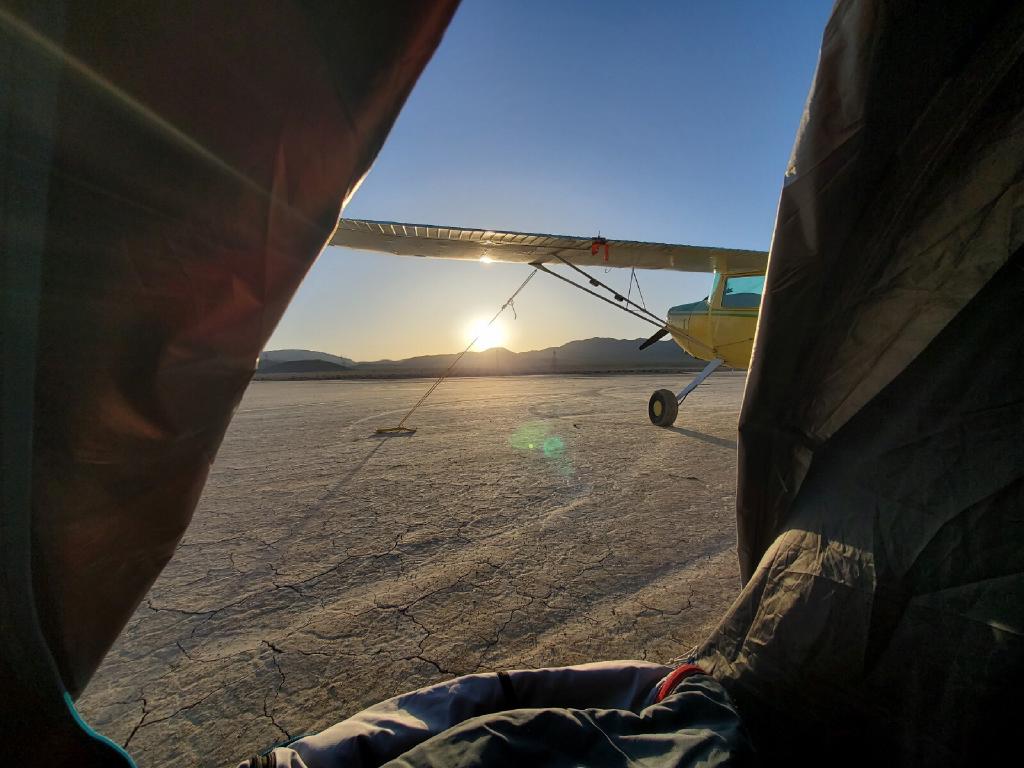 Sunrise as Seen From a Tent Airplane Tied