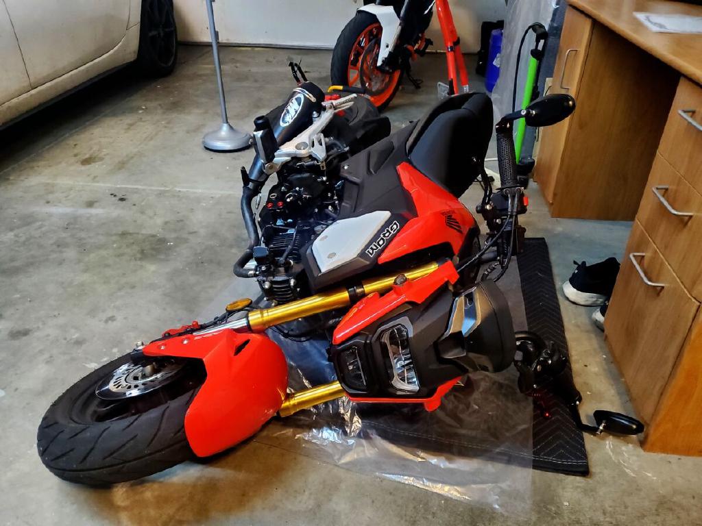 Honda Grom Laying Down on a Blanket Ready